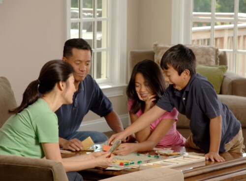 Image of a family discussing critical illness insurance options, planning their financial future.