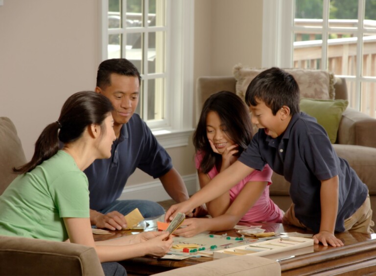Image of a family discussing critical illness insurance options, planning their financial future.